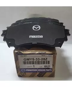 Колодки тормозные Mazda GMY53328Z Передние, Внутри