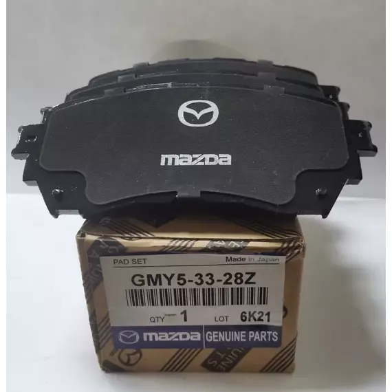Колодки тормозные Mazda GMY53328Z Передние, Внутри